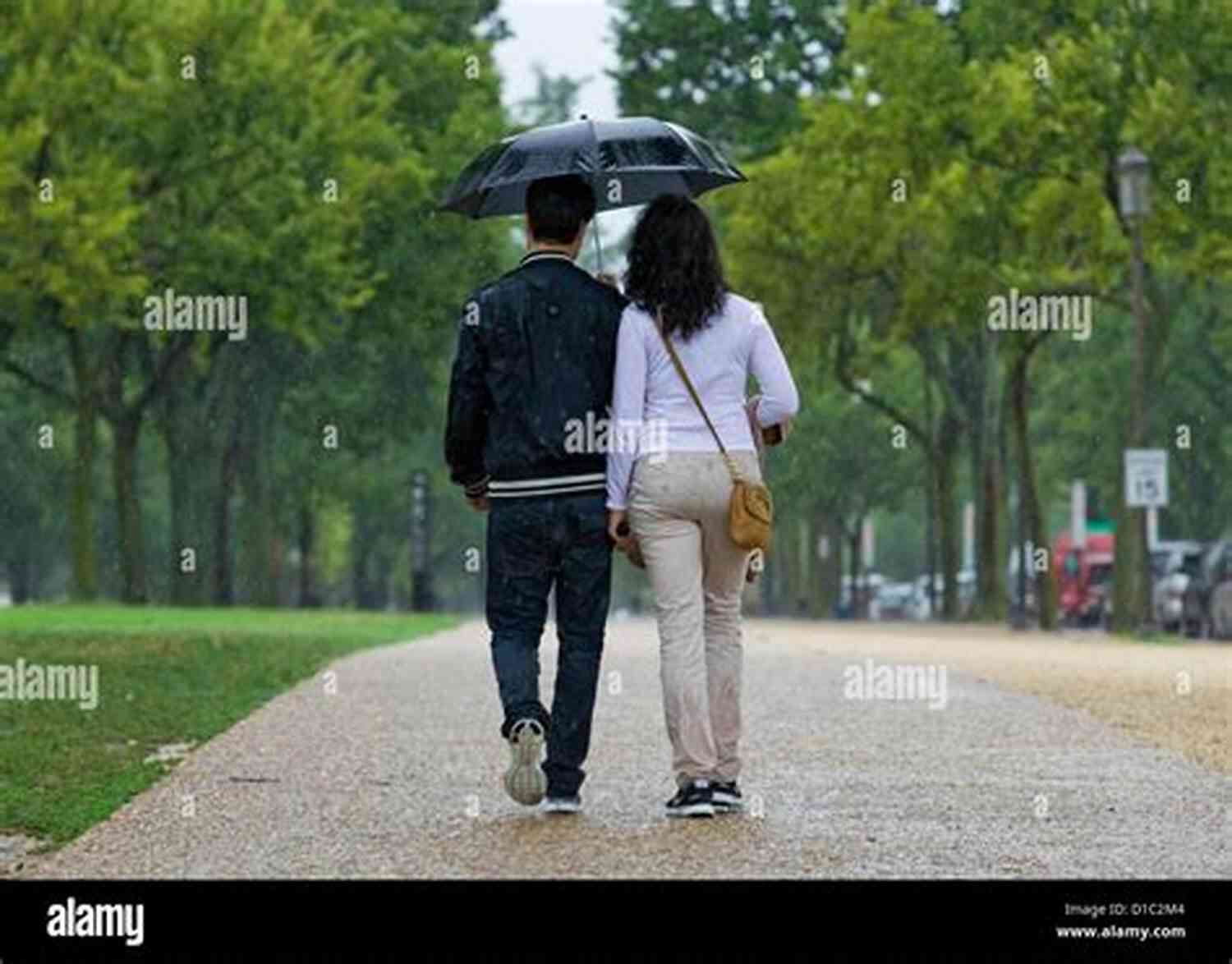 Couple Sharing An Umbrella In The Rain Love That Protects 101 Romantic Text Messages For Your Girlfriend