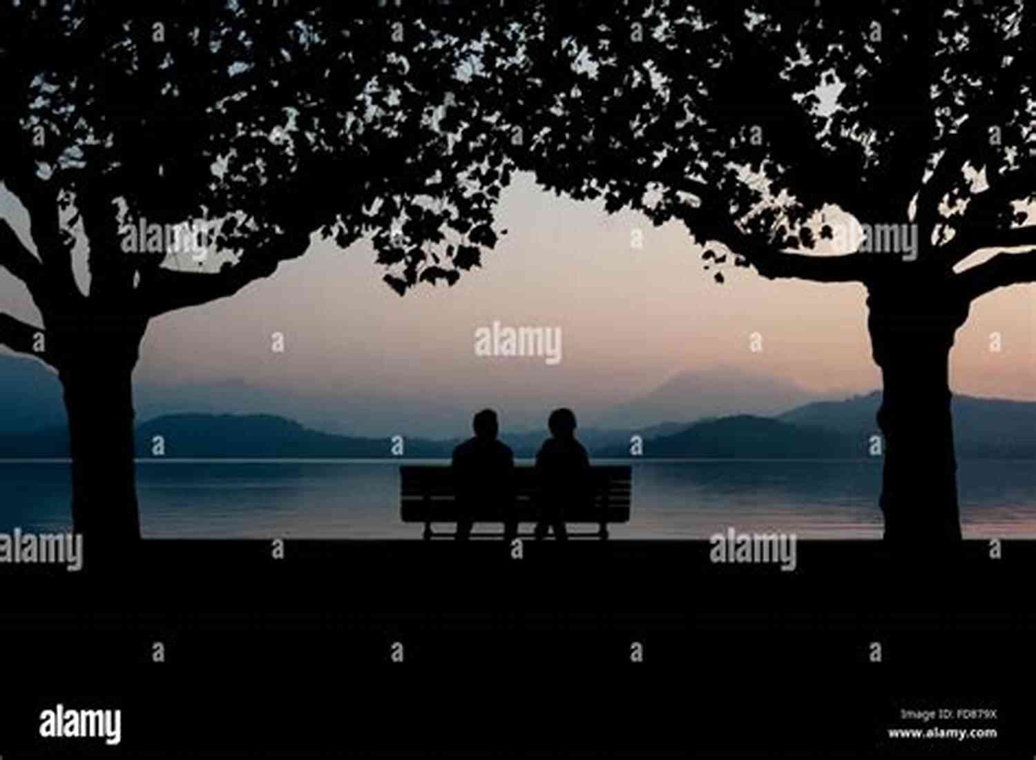 Couple Sitting By A Calm Lake, Finding Peace In Each Other's Embrace 101 Romantic Text Messages For Your Girlfriend