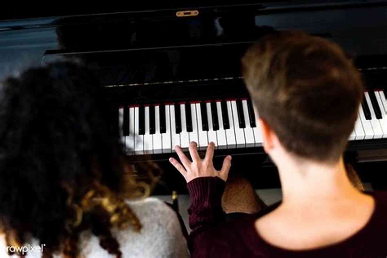 Couple Sitting On A Piano And Playing Music Together 101 Romantic Text Messages For Your Girlfriend