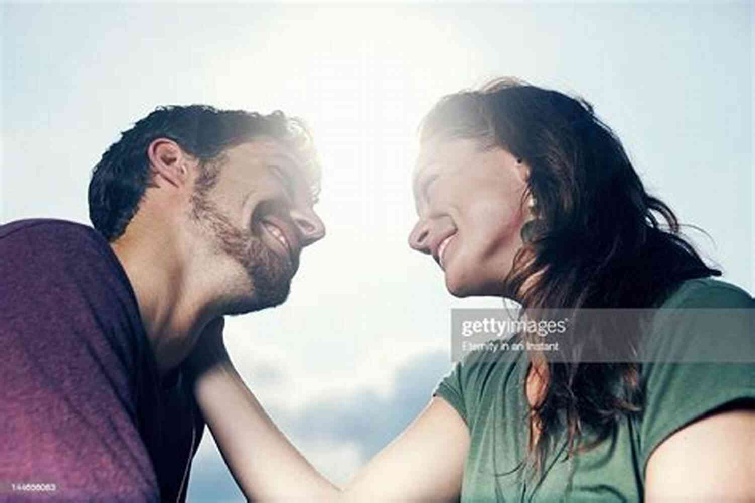 Couple Sitting Together And Staring Into Each Other's Eyes 101 Romantic Text Messages For Your Girlfriend