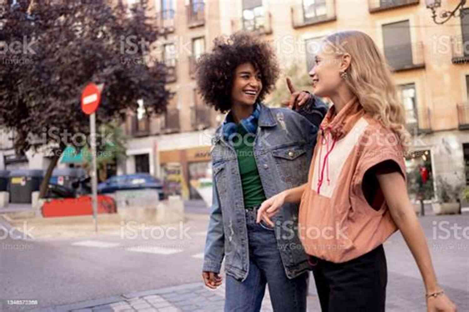 Couple Smiling And Enjoying A Leisurely Walk Together 101 Romantic Text Messages For Your Girlfriend