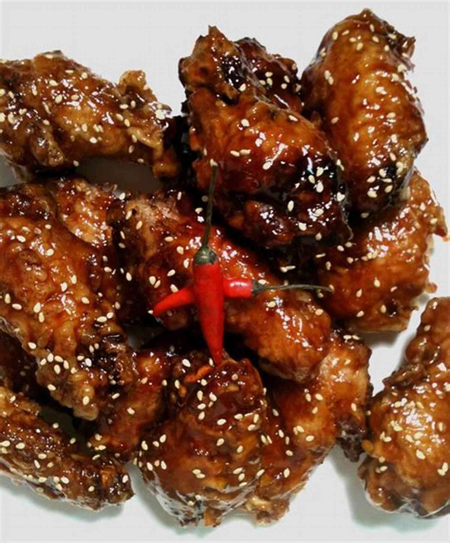 Korean Fried Chicken With A Spicy And Tangy Glaze Korean Foods: 4 Common Flavors Of Korean Fried Chicken